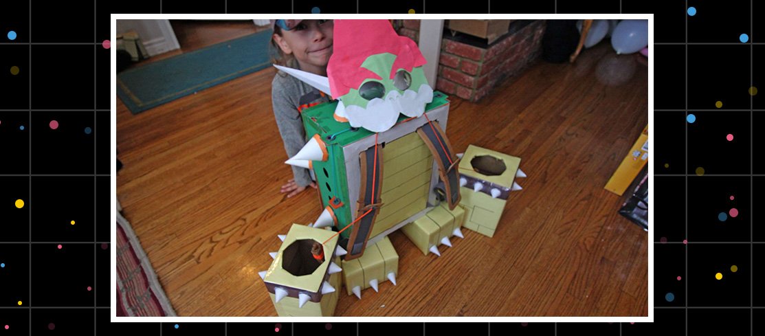 Nintendo Labo Toy-Con Robot creation decorated as Bowser with spike-covered backpack, claws, and paper face mask.