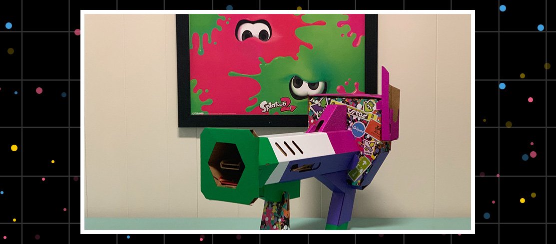 Nintendo Labo Toy-Con Blaster creation decorated as Splattershot item from Splatoon 2 with bright colors, vinyl, and graffiti.