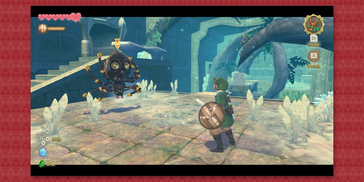 Link faces off against a spider enemy in a dungeon.