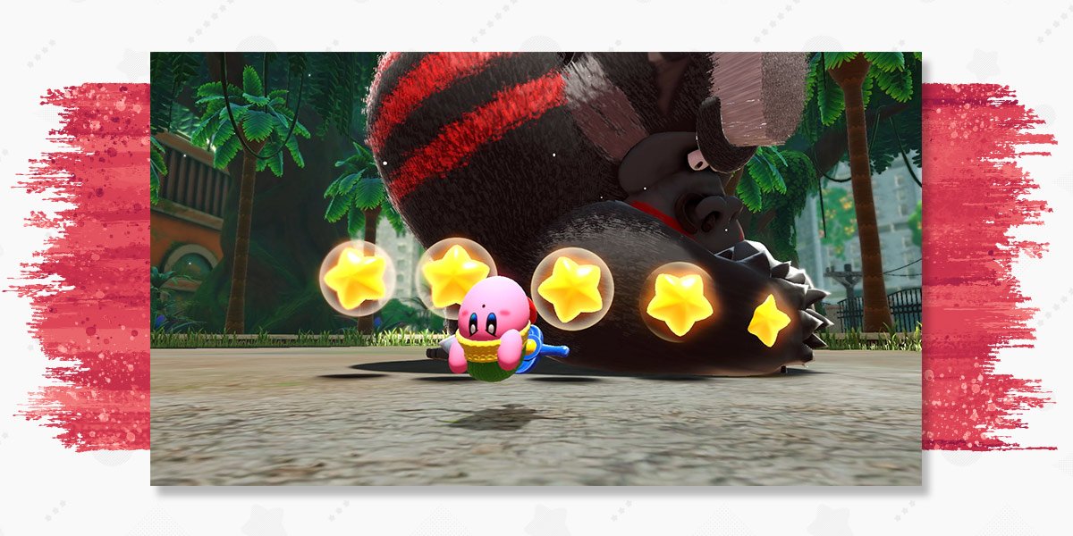 Kirby flips backward to avoid a hit from a giant boss.